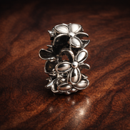 Silver Character Cluster - Tiny Friends Silver Charm — display on walnut