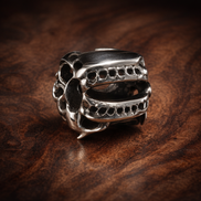 Ribbed Silver Barrel - Polished Ribbed Barrel Spacer — display on walnut