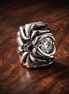 Swirl Pattern Spacer Heart Stone - Sterling Silver Swirl Pattern Spacer Charm With Heart Stone — display on walnut