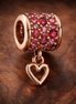 Red Pave Heart Dangle - Rose-Gold-Plated Red Heart Dangle — display on walnut