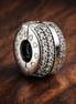 Sparkling Pavé Lines & Logo Clip Charm — display on walnut