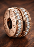 Rose Pandora Spacer - Rose-Gold-Plated Pandora Crystal Spacer — display on walnut