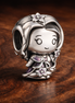 Rapunzel Mini Charm - Rapunzel Purple Dress Charm — display on walnut