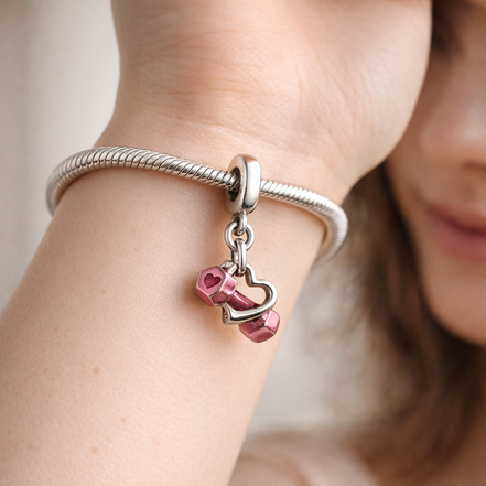 Dumbbell & Heart Dangle Charm — worn on wrist