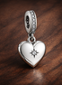 Silver Heart Dangle - Open Silver Heart Dangle Charm — display on walnut
