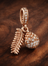 Rose Feather Acorn Dangle - Rose-Gold-Plated Feather and Acorn Dangle — display on walnut