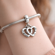 Linked Sister Hearts Split Dangle Charm — worn on wrist
