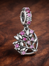 Pink Heart Family Tree Dangle Charm — display on walnut