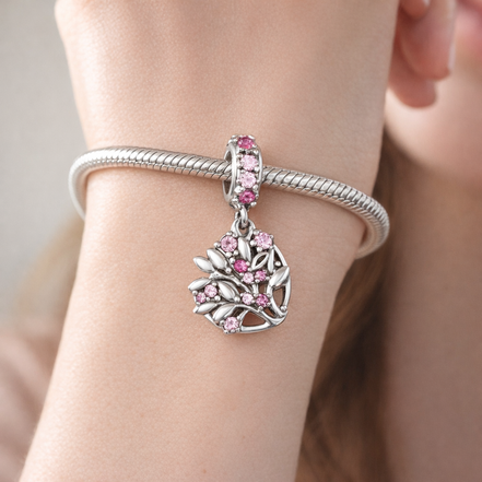 Pink Heart Family Tree Dangle Charm — worn on wrist
