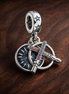 Compass Explorer Dangle - Navy Compass Adventure Charm — display on walnut