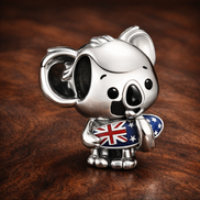 Australian Koala Charm - Koala Australia Flag Charm — display on walnut