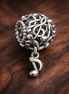 Silver Music Note Dangle - Treble Note Music Dangle Charm — display on walnut