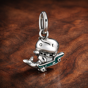 Dinosaur Guitar Teal - Sterling Silver Dinosaur With Guitar Dangle Charm With Teal Enamel — display on walnut