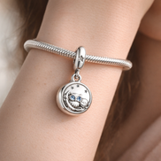 Round Portrait Dangle - Silver Round Story Portrait Dangle — worn on wrist