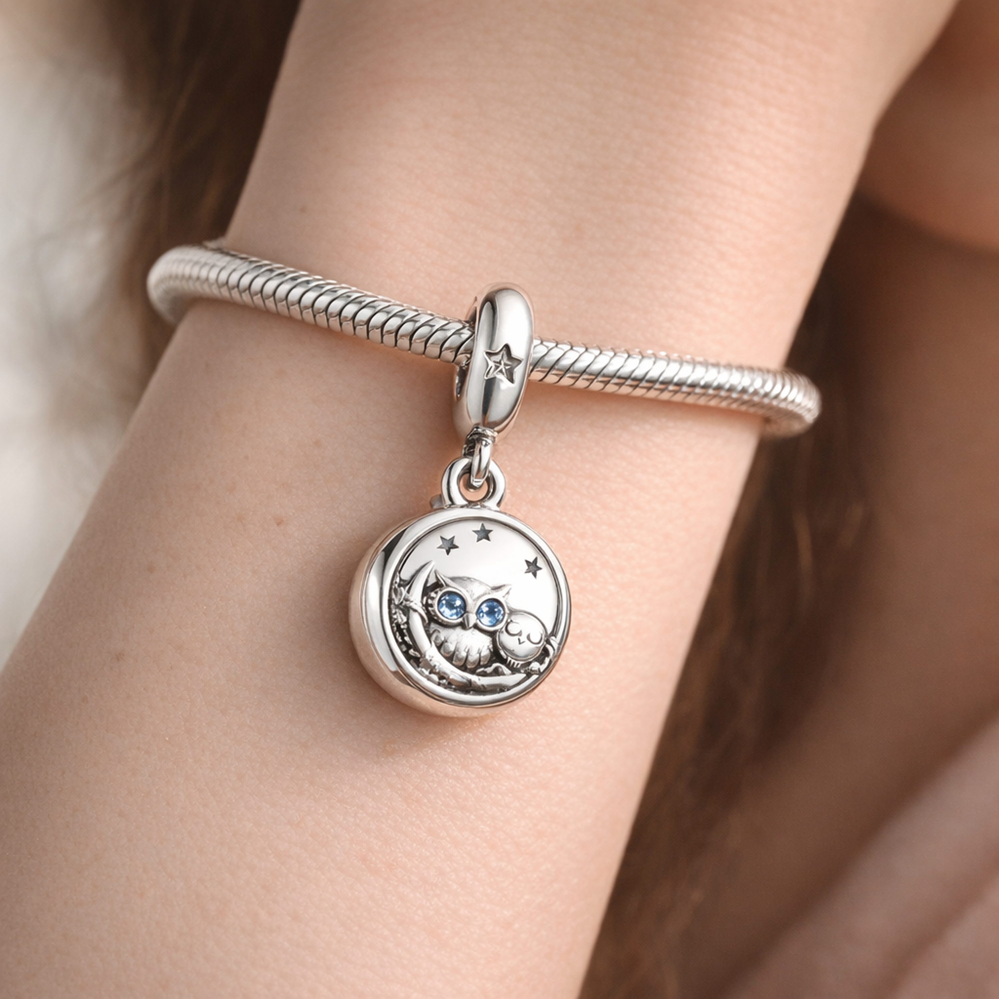 Round Portrait Dangle - Silver Round Story Portrait Dangle — worn on wrist