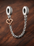 Heart Safety Chain - Rose Heart Safety Chain Charm — display on walnut