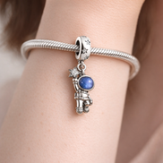 Astronaut Blue Planet Dangle Charm - Astronaut Blue Planet Dangle Charm — worn on wrist