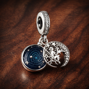 Sun Moon Orbit Dangle Charm - Sun Moon Orbit Dangle Charm — display on walnut