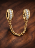 Gold Plated Safety Chain Charm - Gold Plated Safety Chain Charm — display on walnut