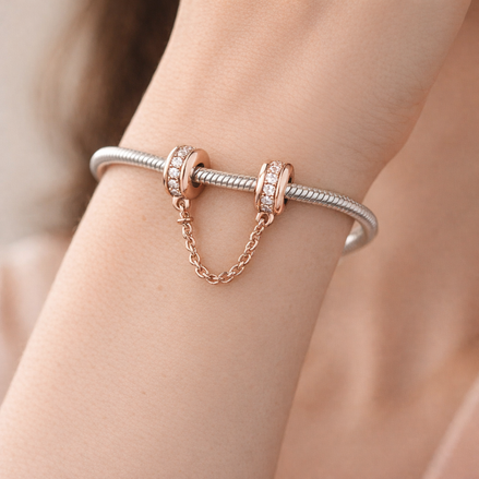 Rose Gold Plated Safety Chain Charm - Rose Gold Plated Safety Chain Charm — worn on wrist