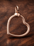 Rose Heart Clasp Charm - Rose Heart Clasp Charm — display on walnut