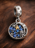 Crescent Moon & Star Night Sky - Crescent Moon & Star Night Sky Dangle Charm — display on walnut