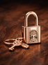 Padlock & Key Dangle Charm — display on walnut
