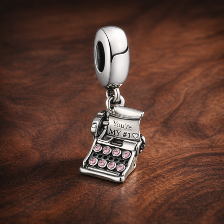 Love Letter Calendar Dangle Charm - Love Letter Calendar Dangle Charm — display on walnut