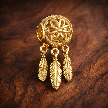 Gold Plated Dreamcatcher Feather Charm - Gold Plated Dreamcatcher Feather Charm — display on walnut