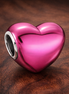 Metallic Pink Heart Charm — display on walnut