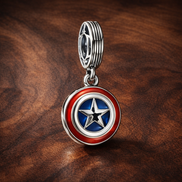 Marvel The Avengers Captain America Shield Dangle Charm — display on walnut