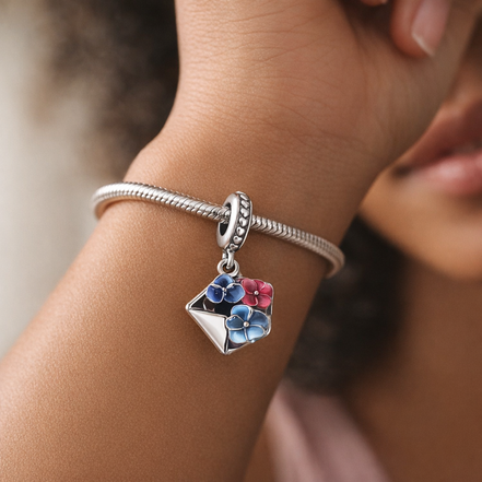Envelope with Flowers Dangle Charm - Envelope with Flowers Dangle Charm — worn on wrist