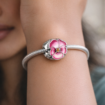 Pink Pansy Flower Charm — worn on wrist