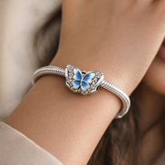 Blue Butterfly Sparkling Charm — worn on wrist