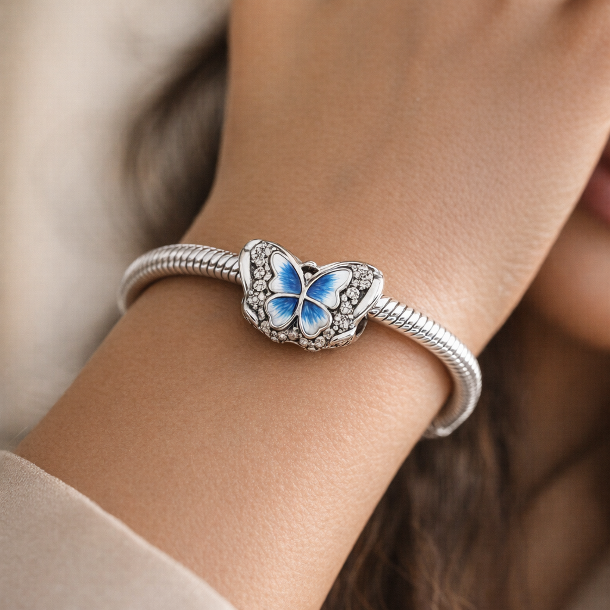 Blue Butterfly Sparkling Charm — worn on wrist