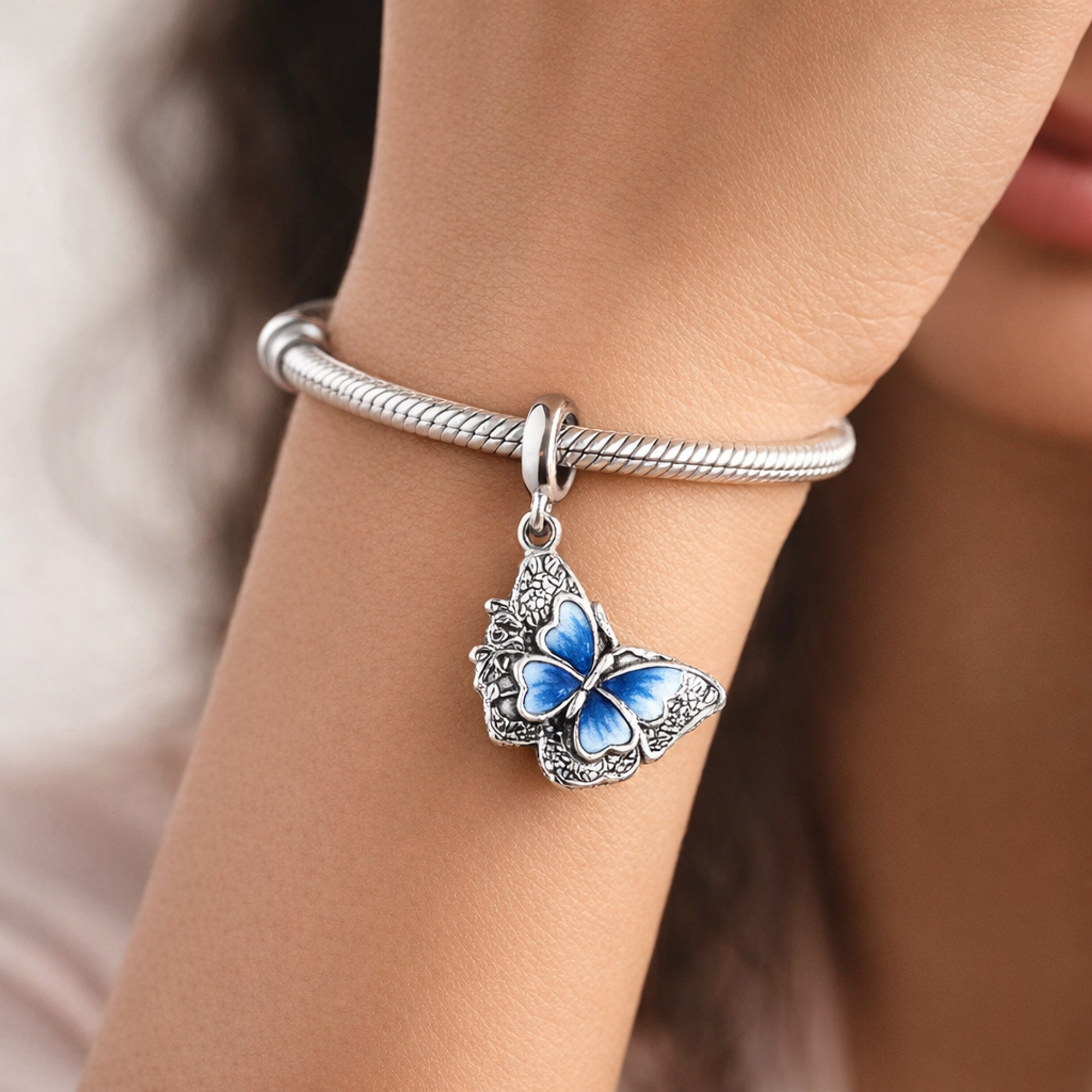 Blue Butterfly & Quote Double Dangle Charm — worn on wrist
