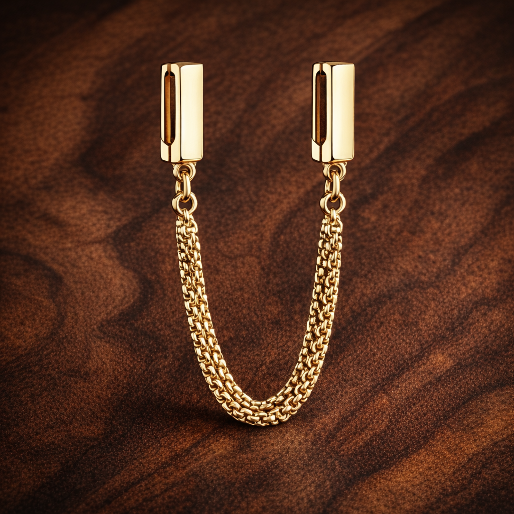 Gold Plated Rectangular Safety Chain Charm - Gold Plated Rectangular Safety Chain Charm — display on walnut