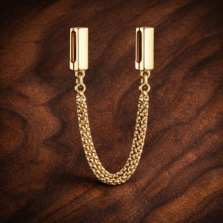 Gold Plated Rectangular Safety Chain Charm - Gold Plated Rectangular Safety Chain Charm — display on walnut
