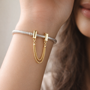 Gold Plated Rectangular Safety Chain Charm - Gold Plated Rectangular Safety Chain Charm — worn on wrist