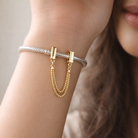 Gold Plated Rectangular Safety Chain Charm - Gold Plated Rectangular Safety Chain Charm — worn on wrist