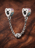Rainbow Arc Safety Chain Charm - Rainbow Arc Safety Chain Charm — display on walnut