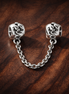 Sparkle Drop Safety Chain Charm - Sparkle Drop Safety Chain Charm — display on walnut