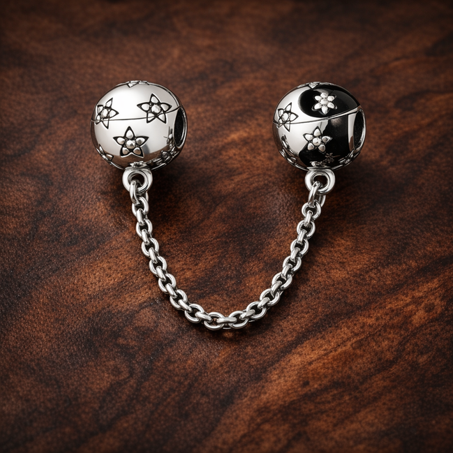 Starry Safety Chain Charm - Starry Safety Chain Charm — display on walnut