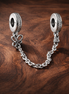 Butterfly Safety Chain Charm - Butterfly Safety Chain Charm — display on walnut
