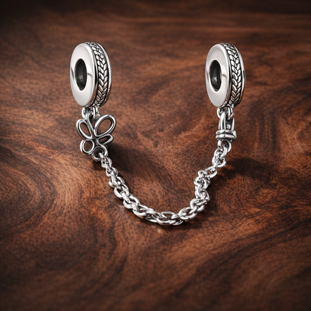 Butterfly Safety Chain Charm - Butterfly Safety Chain Charm — display on walnut