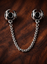 Round Ring Safety Chain Charm - Round Ring Safety Chain Charm — display on walnut