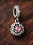 Pink Family Heart Dangle Charm - Pink Family Heart Dangle Charm — display on walnut