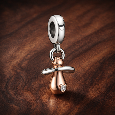 Baby Pacifier Dangle Charm — display on walnut