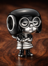 Edna Mode Character Charm - Edna Mode Character Charm — display on walnut