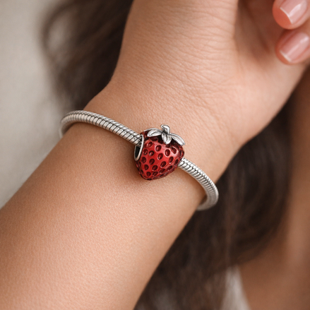 Seeded Strawberry Fruit Charm — worn on wrist